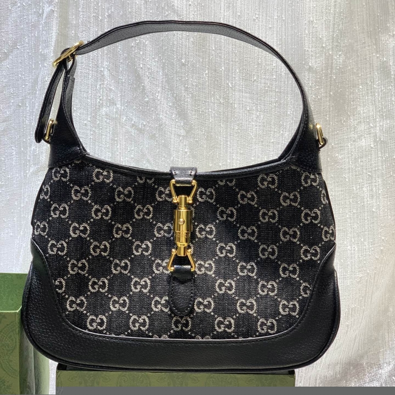 G*u*i top handle bags